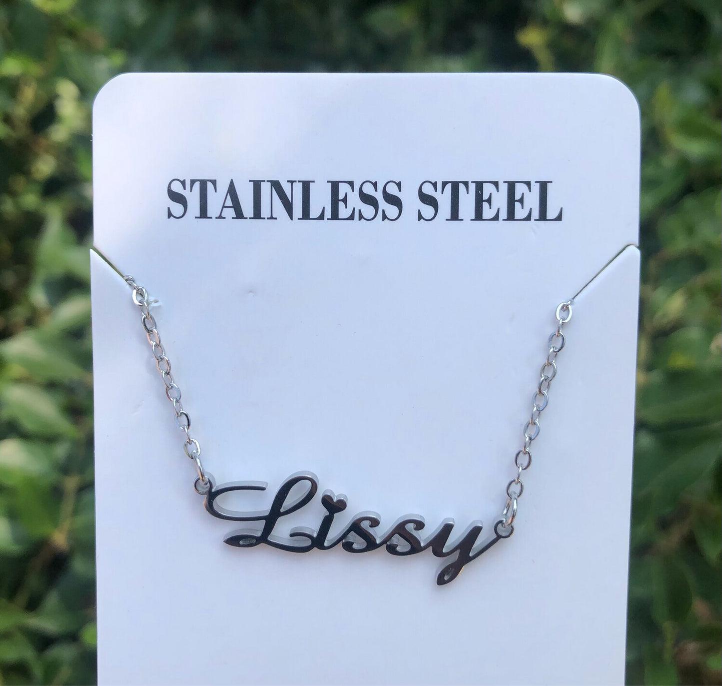 Silver custom name necklace featuring a sleek and shiny stainless steel design, perfect for daily wear.