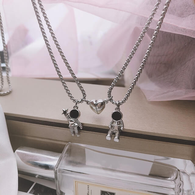 The Astronaut Couple BFF Necklace - heart shaped front view