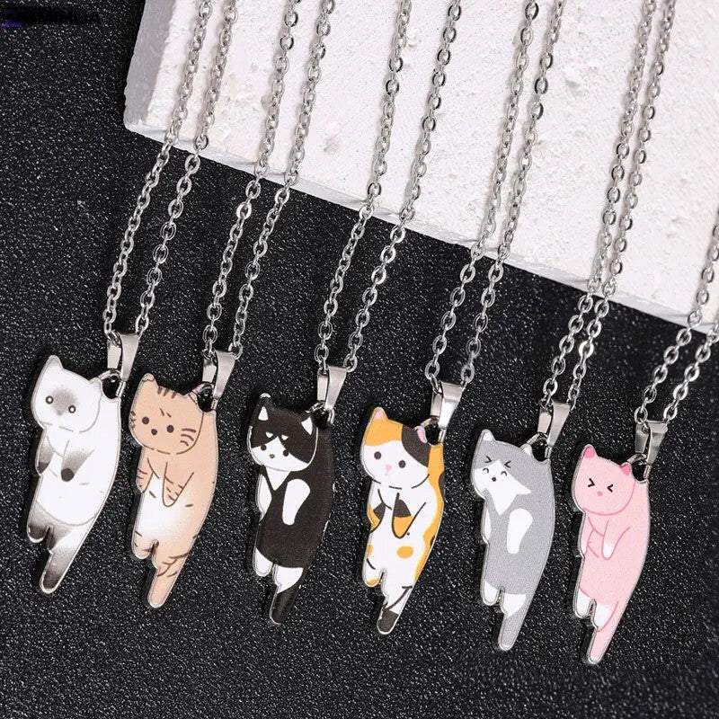 Cat Solo Necklace featuring adorable cat-shaped pendants in different colors including white, black, orange, gray, and pink, attached to delicate silver chains