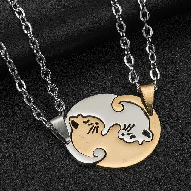 Cuddling Kittens BFF Friendship Necklace - Round shaped Gold color - On the table view