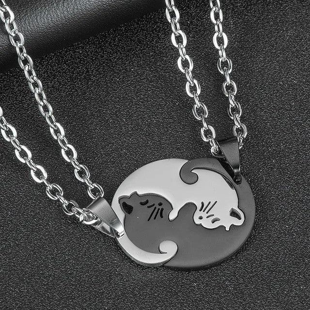 Cuddling Kittens BFF Friendship Necklace - Round shaped Black color - On the table view